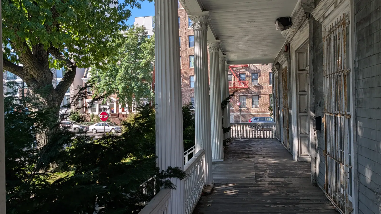 Porch of a pre-war wood-frame building in New York City where painted surfaces are tested for lead