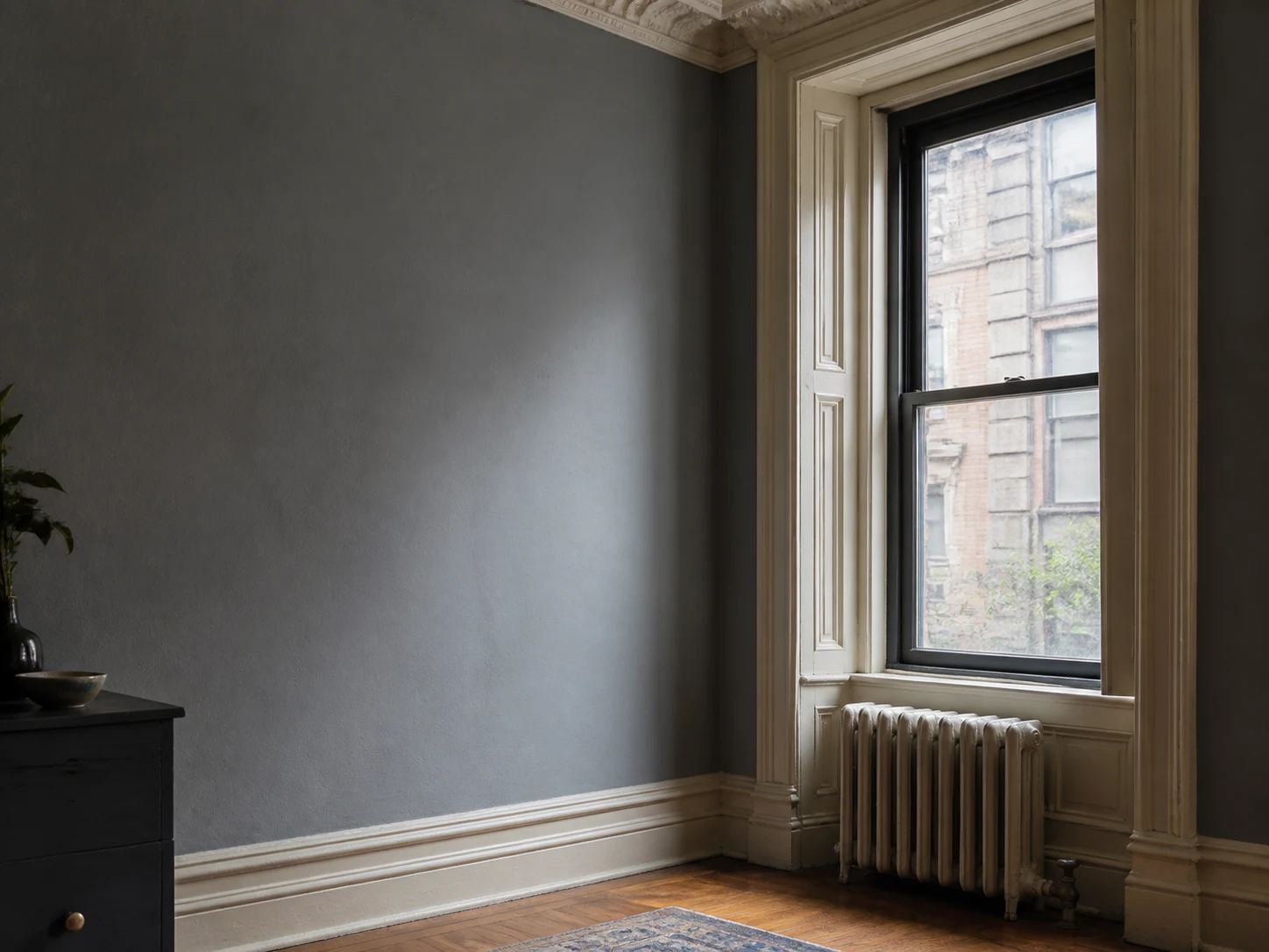 Prewar New York City apartment with original painted window trim and molding